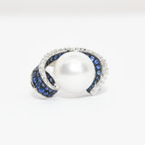Pearl in an Oyster Ring